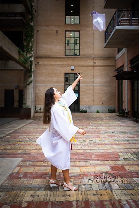 cap anp gown toss senior portraits the pearl brewery