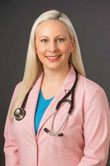 pink lab coat woman doctor san antonio wearing stethoscope